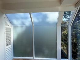 Frosted privacy film on office glass partition