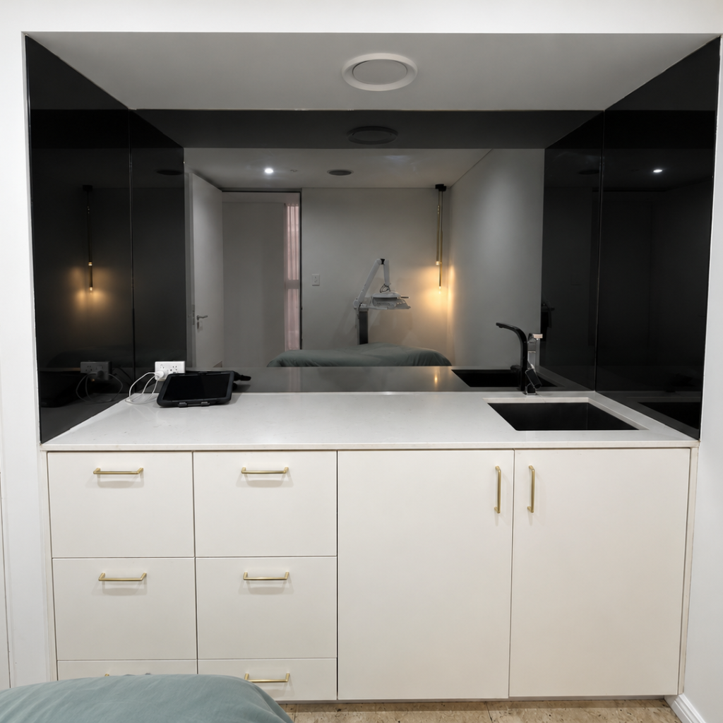 Before architectural wrap installation on cabinetry and mirror wall